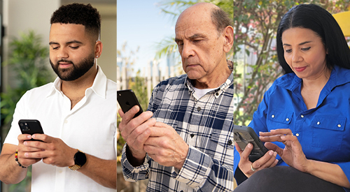 Three Veterans using cell phones.