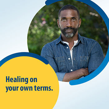 A Veteran standing in a garden and looking into the camera. The text reads: Healing on your own terms.