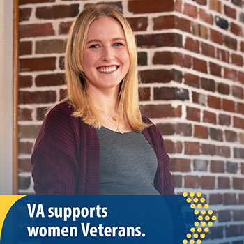 A Veteran standing against a wall with copy that says, “VA supports women Veterans.”