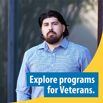 A Veteran standing outside with copy that says, “Explore programs for Veterans.”