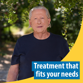 Veteran standing in front of trees. Text reads: Treatment that fits your needs.